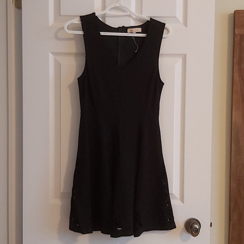 Little black dress with cutout details